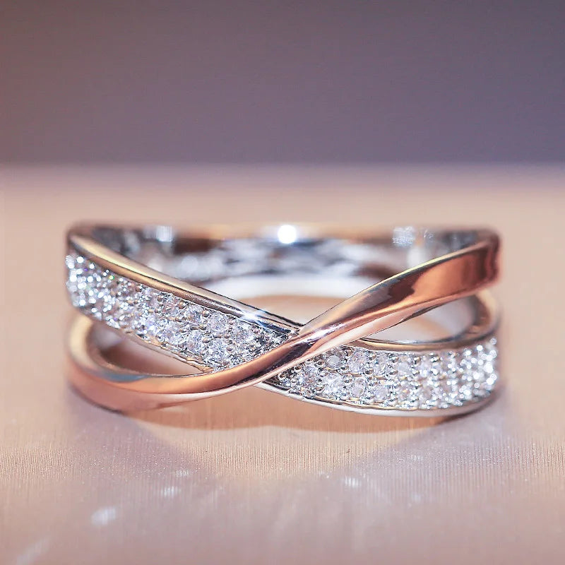 Elegant Huitan Newest Fresh Two Tone X Shape Cross Ring for Women Wedding Trendy Jewelry Dazzling CZ Stone Large Modern Rings. Add this statement piece to your collection today! Limited stock available.