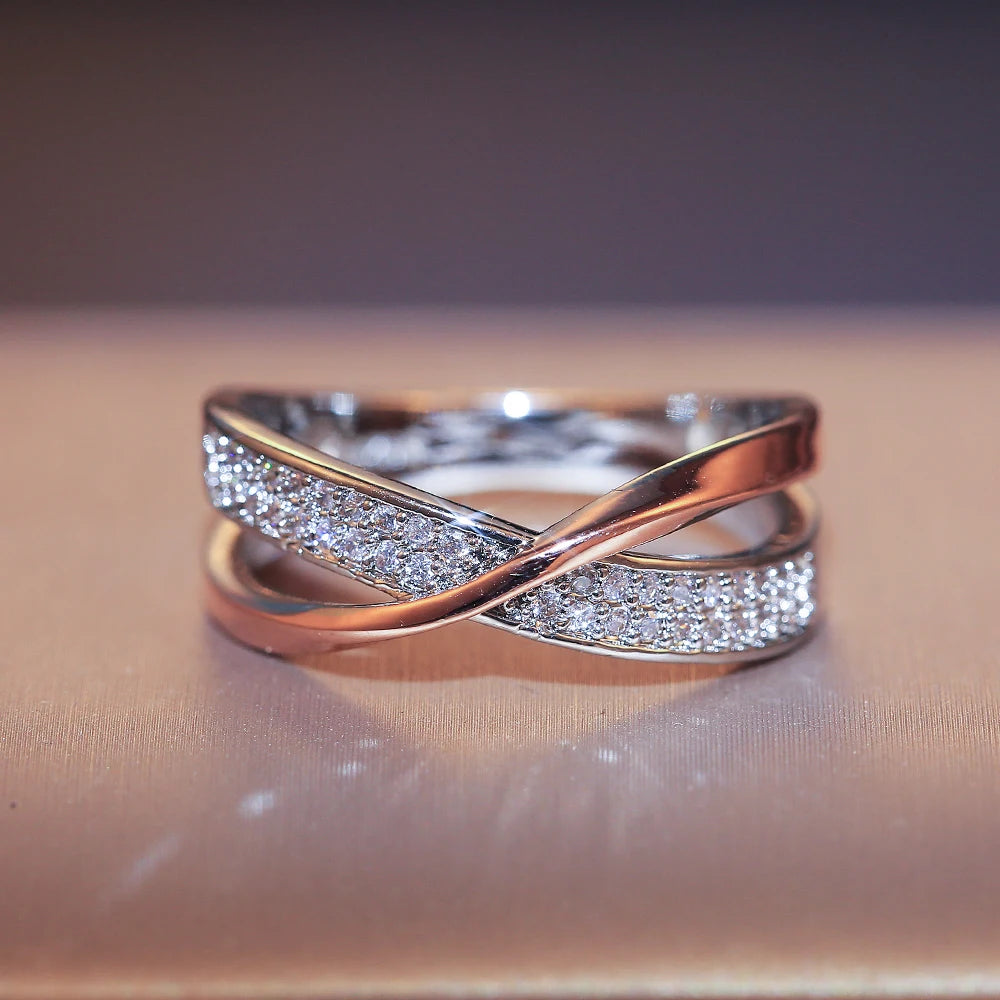 Elegant Huitan Newest Fresh Two Tone X Shape Cross Ring for Women Wedding Trendy Jewelry Dazzling CZ Stone Large Modern Rings. Add this statement piece to your collection today! Limited stock available.