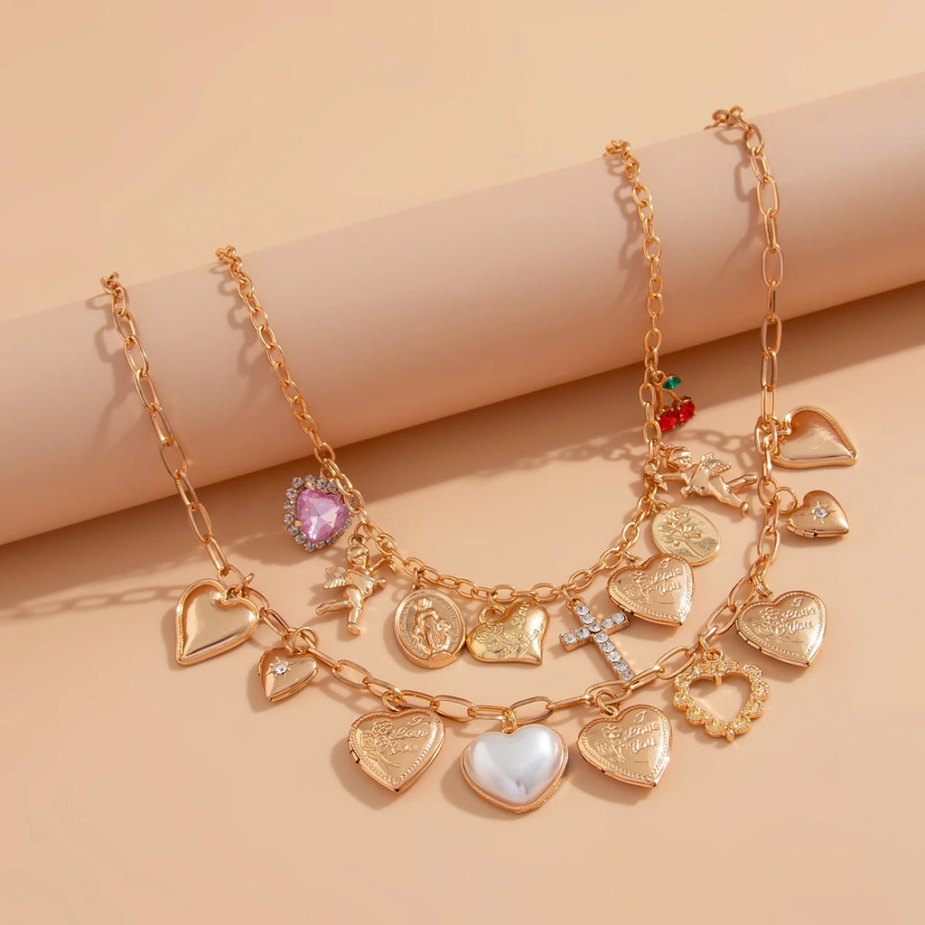 Ingemark Fashionable 2Pcs/Set Punk Classic Metal Chain Necklace for Women Vintage Love Heart Rhinestone Cross Pendant New Year Jewelry Gift. Limited stock available.